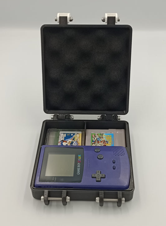 Game Boy Color hard travel case with 8 cartridge storage slots and console cradle